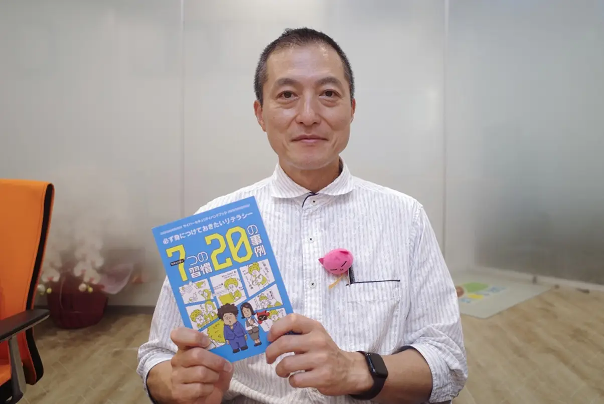 ハンドブックの冊子とPOPを設置した様子